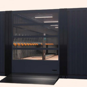 https://www.techni-contact.ovh/ressources/images/produits/merchandising/abri-velos-avec-porte-sectionnelle-94793721-1.jpg - Fabriqué par 3 conteneurs de réutilisation 40'HC