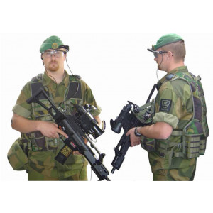 https://www.techni-contact.ovh/ressources/images/produits/merchandising/gilet-tactique-de-combat-48107-1.jpg - Intégration de protections balistiques et d’équipements