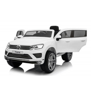 https://www.techni-contact.ovh/ressources/images/produits/merchandising/voiture-electrique-enfant-vw-touareq-7907416-1.jpg - Sous licence Volkswagen - Fournit avec une télécommande parentale