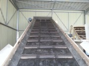 Bande transporteuse caoutchouc à tasseaux