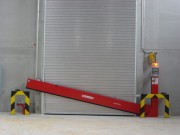 Barrière pivotante de rétention des eaux d'extinction incendie