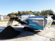 Cribleur à trommel sur chenilles Gremac e1