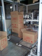 Empileur dépileur de caisses