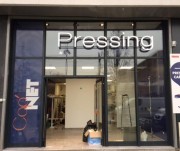 Enseigne lumineuse pour pressing