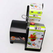 Distributeur automatique pour étiquette longues