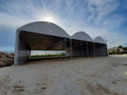 Tunnel de stockage métallo textile - Dim. L10,40 à 28,40 x H9,90 m - Couverture PVC